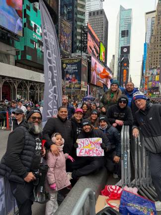 NYC Half Marathon Dyckman Run Club cheer section on Seventh Avenue.