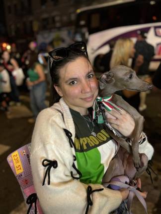 Giselle Girraputo holds her beloved Italian greyhound Giovanni as she made her second visit to this year’s festival on Sept. 14. She says she comes every year “for the people and the food.”