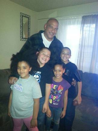 Angel Soler with his grandchildren. Photo courtesy of Angel Soler
