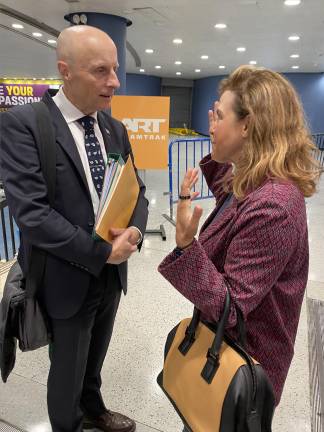 Andy Byford, the Amtrak executive that Donald Trump put in charge of the Penn Station rebuilding project, discusses plans with Chelsea community activist Layla Law Gisiko at a press conference held inside Penn Station on Aug. 27.