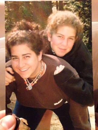 Caroline (left) with her sister Natalie at Camp Walden in 2004. Photo: Courtesy of Caroline Rothstein