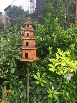 Mele comes up with all designs, like this ornamental, tiered birdhouse. Photo: Carson Kessler