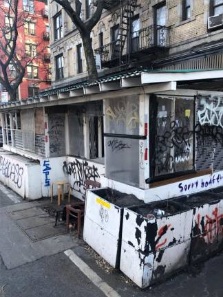 Some residents complain that sheds, such as this one on Avenue A in the East Village, have been abandoned and become a magnet for garbage, graffiti and rodents. Photo: Keith J. Kelly
