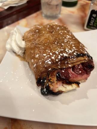 District 5 Council Member Julie Menin is passionate about the crepes with raspberry jam at Budapest Cafe.