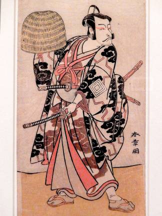 "Kabuki Actor Ichikawa Danjuro V" carries a bamboo helmet in this 1774 woodblock print. Photo: Adel Gorgy