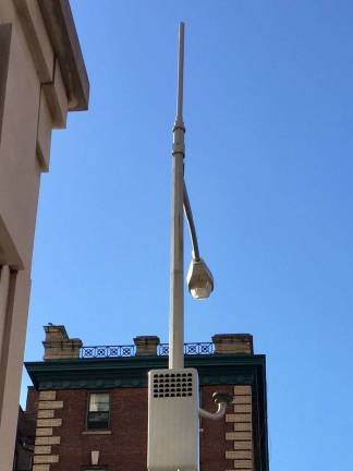 A new wireless cellular antenna mounted on a streetlight at the southeast corner of First Avenue and East 66th Street. It's just down the block from another light pole, at 404 East 66th Street, where residents are trying to block the installation of an antenna across the street from an elementary school. Photo courtesy of Anat Rosenberg