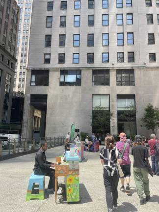 During the powerful finale of the launch ceremony, 25 players took to the pianos to simultaneously perform a resounding rendition of Bach’s prelude and fugue in C major. (Photo: Jacqueline Gordon)