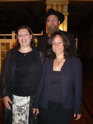 When Heshy Fellig, rear, an Orthodox Jew from California, needed a living kidney donor about 10 years ago, Lauren Finkelstein, right, sent out an alert through her organization, Save 1 Person. Marisa Hester, a Christian from Alabama, responded. Following a successful transplant, Hester and Finkelstein attended Heshy's daughter's wedding in Brooklyn. Photo courtesy of Lauren Finkelstein