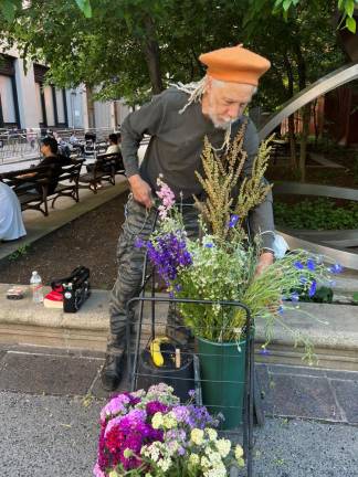 Martin Fritsche arranging his flowers. Photo: Nina Huang