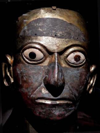 Mask, Moche, A.D. 300–600, Gilded copper, shell, stone, and pigment from Peru, Huaca de la Luna, on loan from LindenMuseum, Stuttgart, Germany. Photo: Adel Gorgy