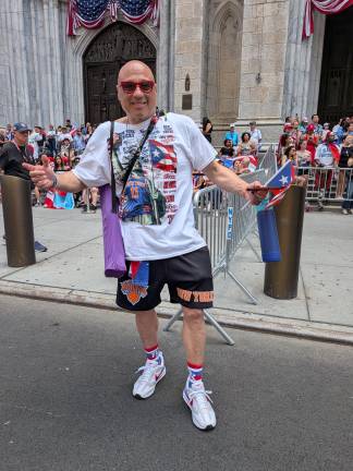 Puerto Rican Day Parade included many people showing both Boricuan and Knicks pride.