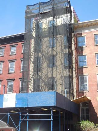 The Hopper-Gibbons House at 339 West 29th St. was a stop on the Underground Railroad. Its current owner wanted to modify the rooftop and rear additions but was denied. Preservationists want to restore the home. Photo: Raanan Geberer