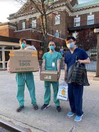Essential workers at Montefiore Medical Center recieving a meal delivery.