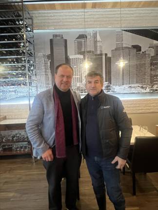 Dino Redzic (left), the operator of Uncle Paul’s Pizza, with his partner Nick Krkuti.