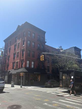 The building on Bleeker Street where residents and the landlord claim an man in one of the apartments had not paid rent in months.