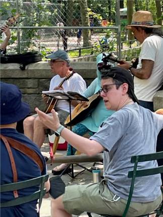 Missy Cohen chooses “You Are My Sunshine” for the jam, which gathers on Sunday afternoons. Photo: Christopher Moore