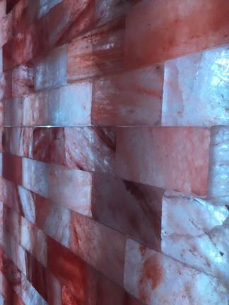 The walls of the salt room are made from blocks of aged Himalayan salt. Photo: Carson Kessler