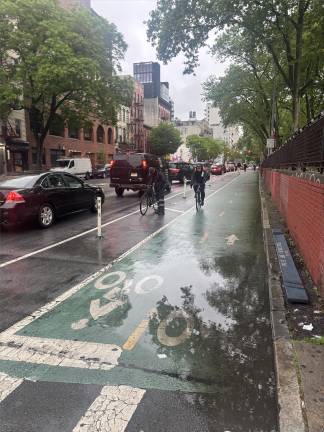 It’s not tough to find e-bikes or pedal bikes apparently violating traffic laws. On May 9, a rainy day, an e-bike heads the wrong way down Chrystie Street in a double bike lane.