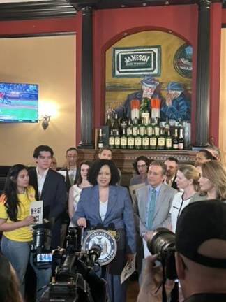 President of the Manhattan Chamber of Commerce, Jessica Walker, speaks at HOST Act press conference.