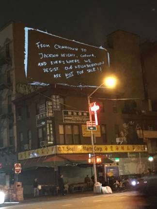 An outdoor mobile projection created by Chinatown Art Brigade, an artists and activists collective. Photo: Claire Wang