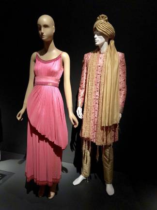 Fashion Editor Diana Vreeland once called pink “the navy blue of India.” Bonnie Cashin, dress made from brocaded silk Indian sari, 1957. MFIT, Gift of the Estate of Bonnie Cashin. Man’s Banarasi silk wedding Sherwani with pajamas, turban and stole, 2018. MFIT, museum purchase. Photo: Val Castronovo 