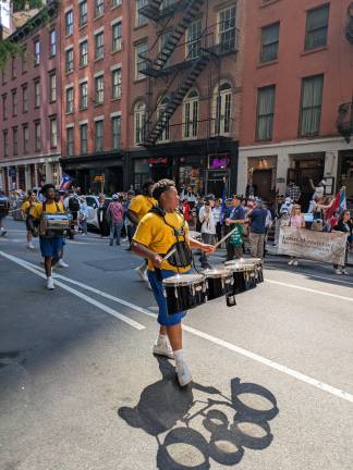 Drum Corps from Vernon, NJ, marches down Pearl Street.