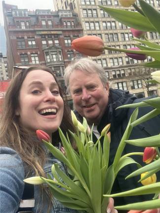 Jordan Gelber with her father, Arthur, picking flowers for her mother at Tulip Fest 2025 in Union Square on March 30.