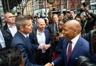 Mayor Eric Adams shakes hands with the Transportation Secretary Sean Duffy before embarking on a two stop subway “tour” on the B Line on April 4. Duffy, who had earlier called the subway system a “shithole” apparently did not change his tune after the ride with hizzoner.