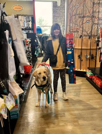 Like most pre-teens, Naomi loves a good shopping trip to the mall, and can do so with service dog Elroy by her side. (If only Elroy had a credit card to pay for everything.)