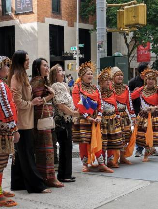 Filipina women pose for group photo.