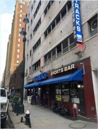 <b>Tracks Sports Bar, which was already forced out of the LIRR level when Penn Station was renovated six years ago, could be displaced from its berth on W. 31st St. if the block south of Penn Station where it now sits is demolished for a new rail tunnel.</b> Photo: Keith J. Kelly