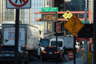 Drivers head into the Lincoln Tunnel during the evening rush, March 7, 2025.