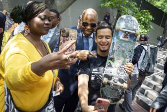 Mayor Eric Adams poses with skaters at the opening of The Arches, a park conducive to skating underneath the Brooklyn Bridge. It’s part of his $375 million Working’s People Agenda revitalization project. Photo: Ed Reed, Mayoral Photography Office