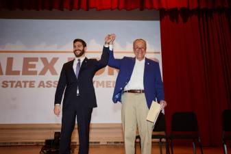 First term NYS Assemblyman Alex Bores (left) at an induction celebration with Senator Chuck Schumer at Hunter College on Feb. 5. Photo: Office of Assemblyman Alex Bores.