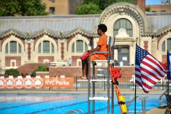 A lifeguard monitors the Hamilton Fish Pool on the Lower East Side amid nationwide staffing shortages. Photo: NYC Parks / Daniel Avila