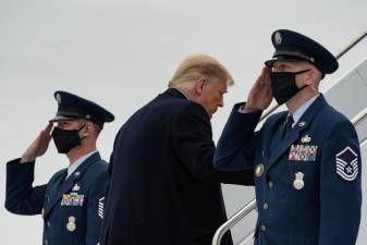 President Donald J. Trump disembarks Marine One at Valley International Airport in Harlingen, Texas Tuesday, Jan. 12, 2021, and boards Air Force One en route to Joint Base Andrews, Md. Official White House Photo by Shealah Craighead