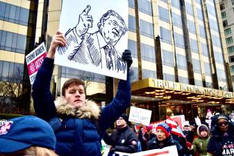 At the Columbus Circle rally, near Trump International Hotel.