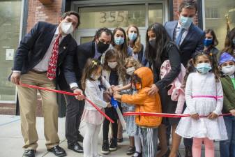 Council Member Ben Kallos cuts the ribbon on a French Dual Language Program for Pre-K students. Photo by Jeff Reed via New York City Council Flickr