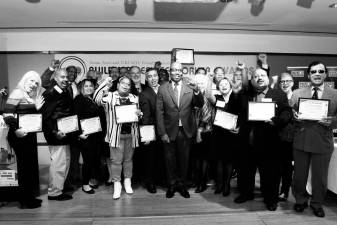 Honorees after the event with emcee Errol Louis (center) and Straus Media President and Publisher Jeanne Straus (right of center).