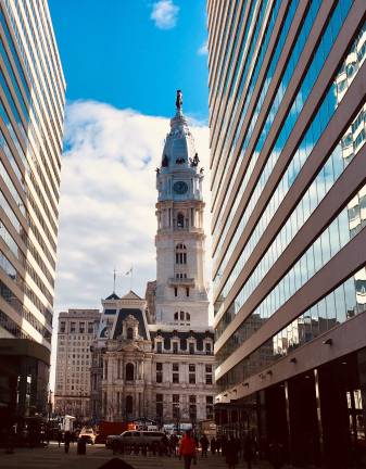 A view of the north side of Philadelphia’s City Hall, topped by Alexander Milne Calder’s 1892 statue of William Penn. Opened in 1894, this Second Empire-style building is still being used today for municipal functions. The buildings on the right and left of City Hall are part of the Penn Center complex.