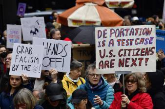 A crowd estimated at over 1,500 people marched from Bryant Park to Madison Square Park on April 5 as part of nationwide “Hands Off” demonstrations protesting policies of the Trump administration.
