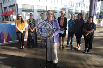 Manhattan Borough President Gale A. Brewer with mural artists