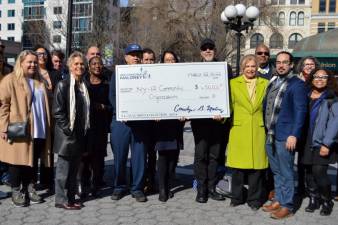Congresswoman Carolyn Maloney (third from right) poses in Union Square with representatives of ten local organizations for which she helped allocate funding. Photo: Abigail Gruskin