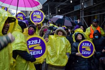 Union workers and supporters turned out for a protest across the street from Twitter’s Manhattan headquarters, where janitors lost their jobs after the tech company terminated its contract with Flagship Services. Photo: Abigail Gruskin