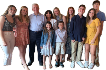 Peter Costiglio (third from left) and wife of 54 years, Barbara, to his right with their nine grandchildren at a family gathering in a restaurant in White Plains, NY, following a high school graduation ceremony for one of his grandchidren in June, 2023.