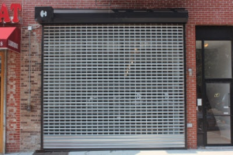 The NY City Council reversed a local law which would have required storeowners to replace existing security gates with grilles that have 70% visibility, such as the one above, from the sidewalk.