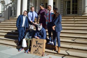 From left to right: City Council Members Shaun Abreu, Erik Bottcher, Sandy Nurse, Chi Ossé and Carlina Rivera posed outside City Hall with two rats that were protesting new legislation passed on Thursday. Photo: Abigail Gruskin
