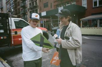 Songwriter Ed Sheeran (left) being interviewed by co-host Jack Coyne, is among the celebrities who have made their way to Astor Place to appear on “Trackstar*,’ a music trivia contest that has nearly 200,000 followers on Tik Tok. Photo: Courtesy Public Opinion Inc.