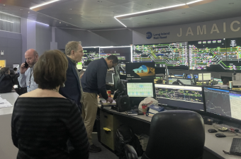 MTA Chair and CEO Janno Lieber (center) and LIRR Interim President Catherine Rinaldi (back to camera) visited the LIRR’s Central Control operations in Jamaica on March 1, as complaints about the new operation and schedules mounted. Photo: MTA