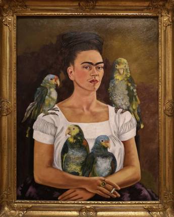 Frida Kahlo’s self-portrait “Me and My Parrots” from 1941 is on loan from a private collection. Photo: Adel Gorgy